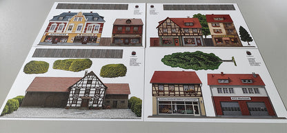 Modellbahnhintergrund 4er Set Fachwerkbauernhof und ländlicher Einzelhandel Spur H0 1zu87