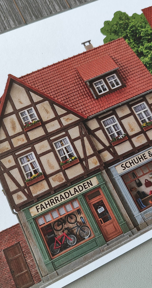 Model railway backdrop two-story buildings bike shop and Edeka H0 with trees and wooden fence 1:87